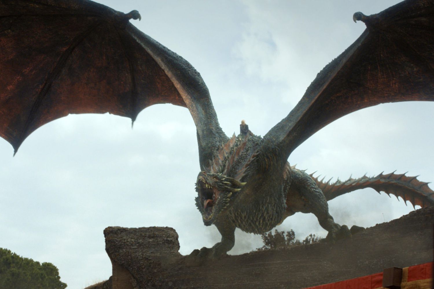 Drogon from Game of Thrones roaring with wings spread